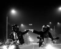 摩托车情侣图片 情侣摩托车骑行的照片