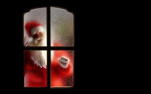 好看金灿灿的圣诞节圣诞老人来敲你的门图片